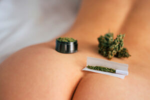 Cannabis on top of a woman's body